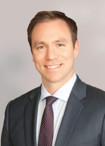 Doctor C Kellner headshot in suit and tie