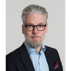 Headshot of Doctor in smart suit and shirt